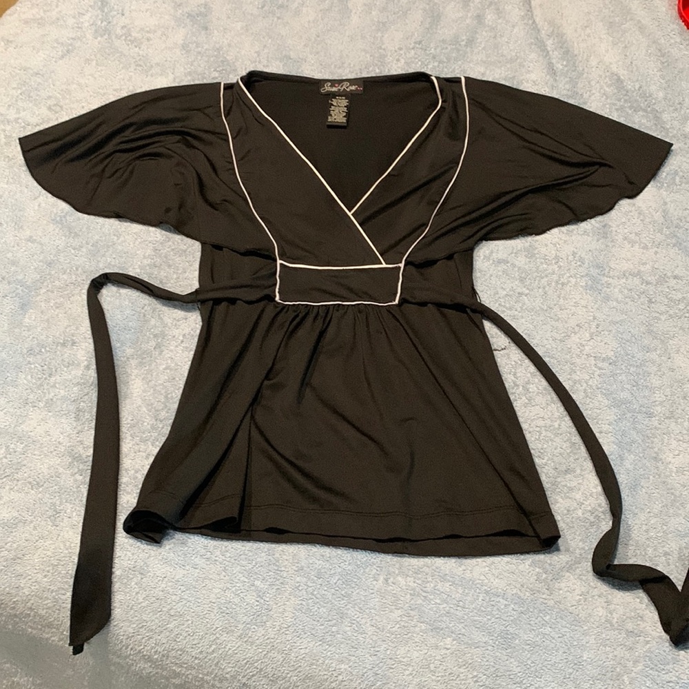 Black Susie top. V neck. Tie in back